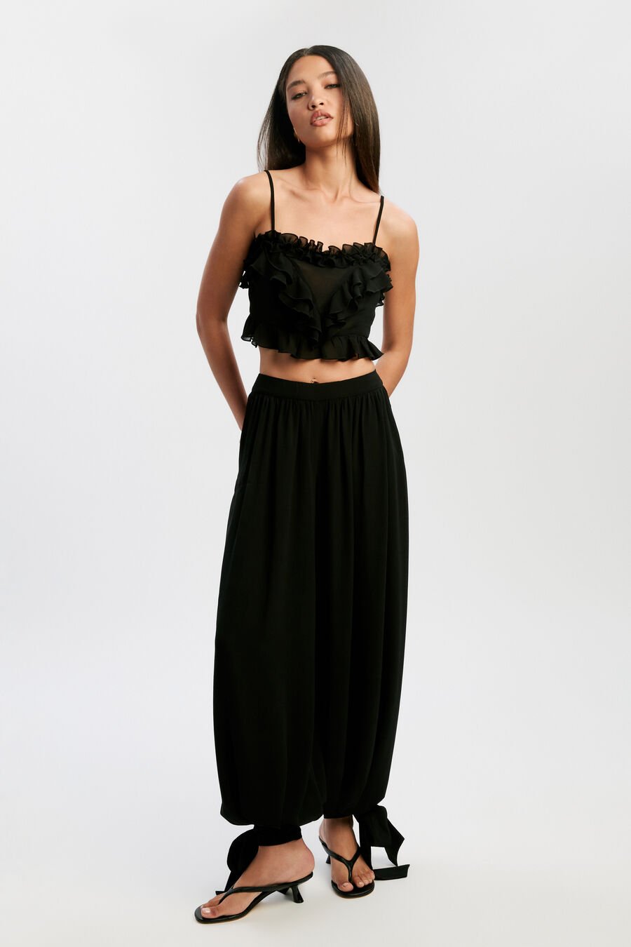 ALIRA FRILL DETAIL CROP TOP in colour BLACK