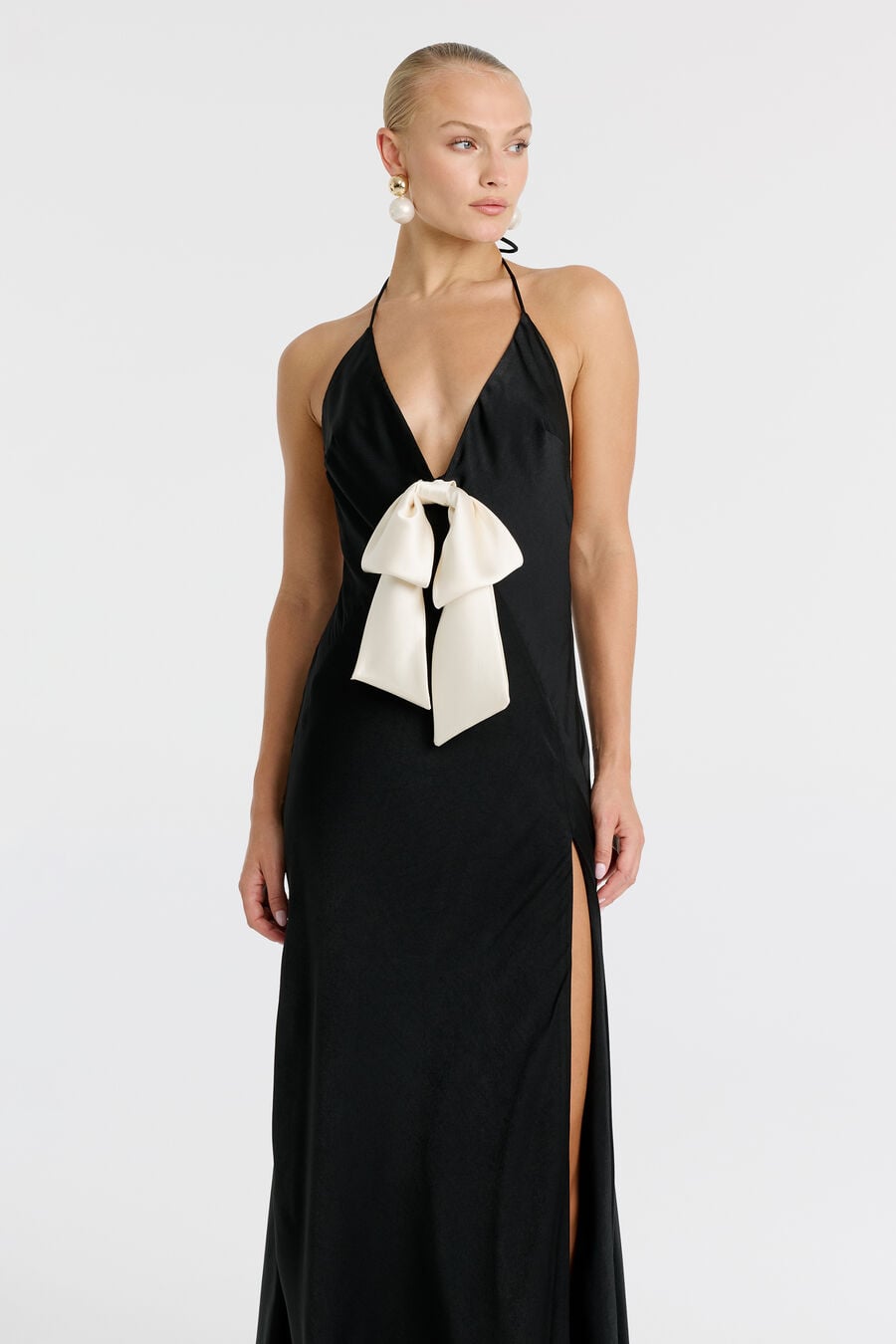 LAVINA BOW HALTER DRESS in colour Black
